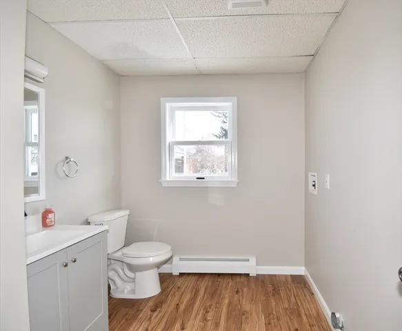 a very nice looking room with wooden floor