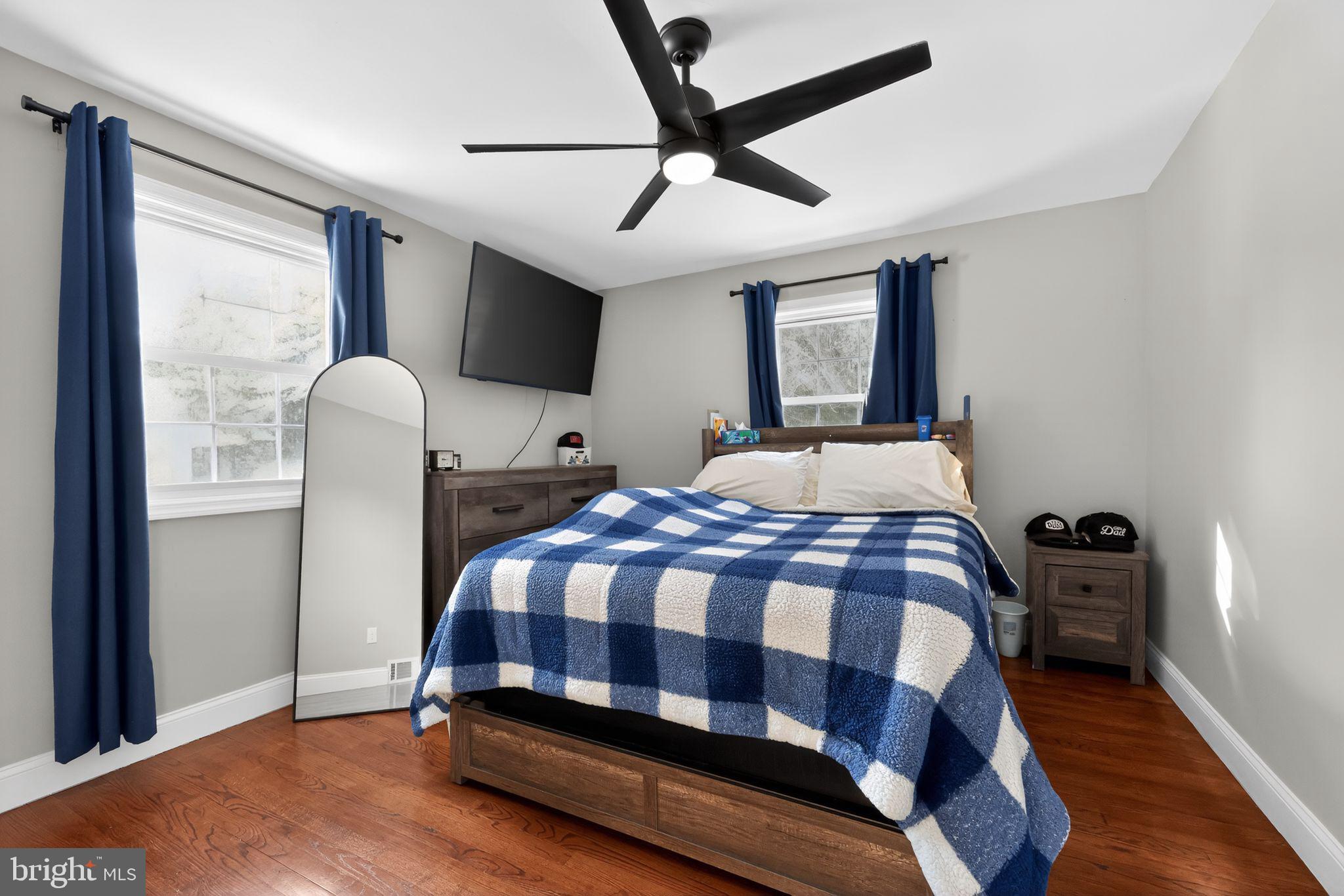 298 South Tuckahoe Road Williamstown, NJ 08094 - Photo 11 of 22 a bedroom with a bed mirror and window