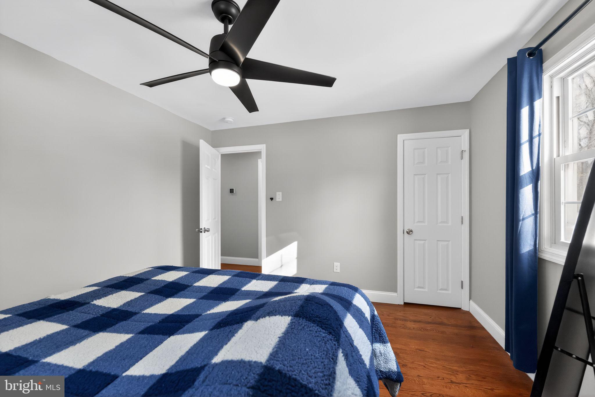 298 South Tuckahoe Road Williamstown, NJ 08094 - Photo 12 of 22 a bedroom with a bed and a mirror