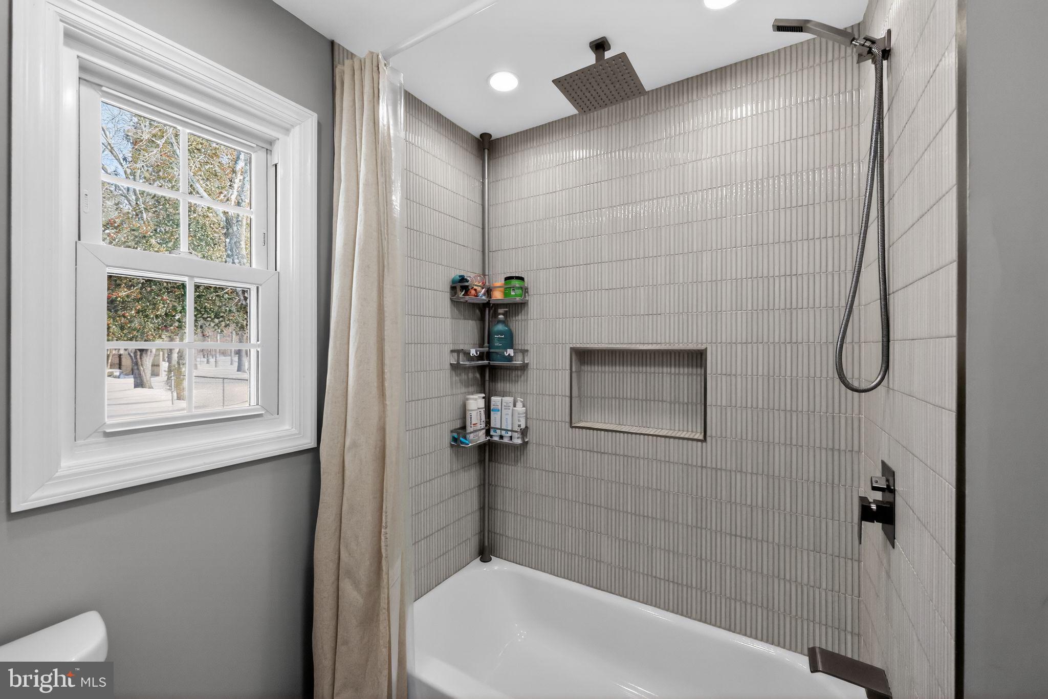 298 South Tuckahoe Road Williamstown, NJ 08094 - Photo 16 of 22 a bathroom with a sink and shower