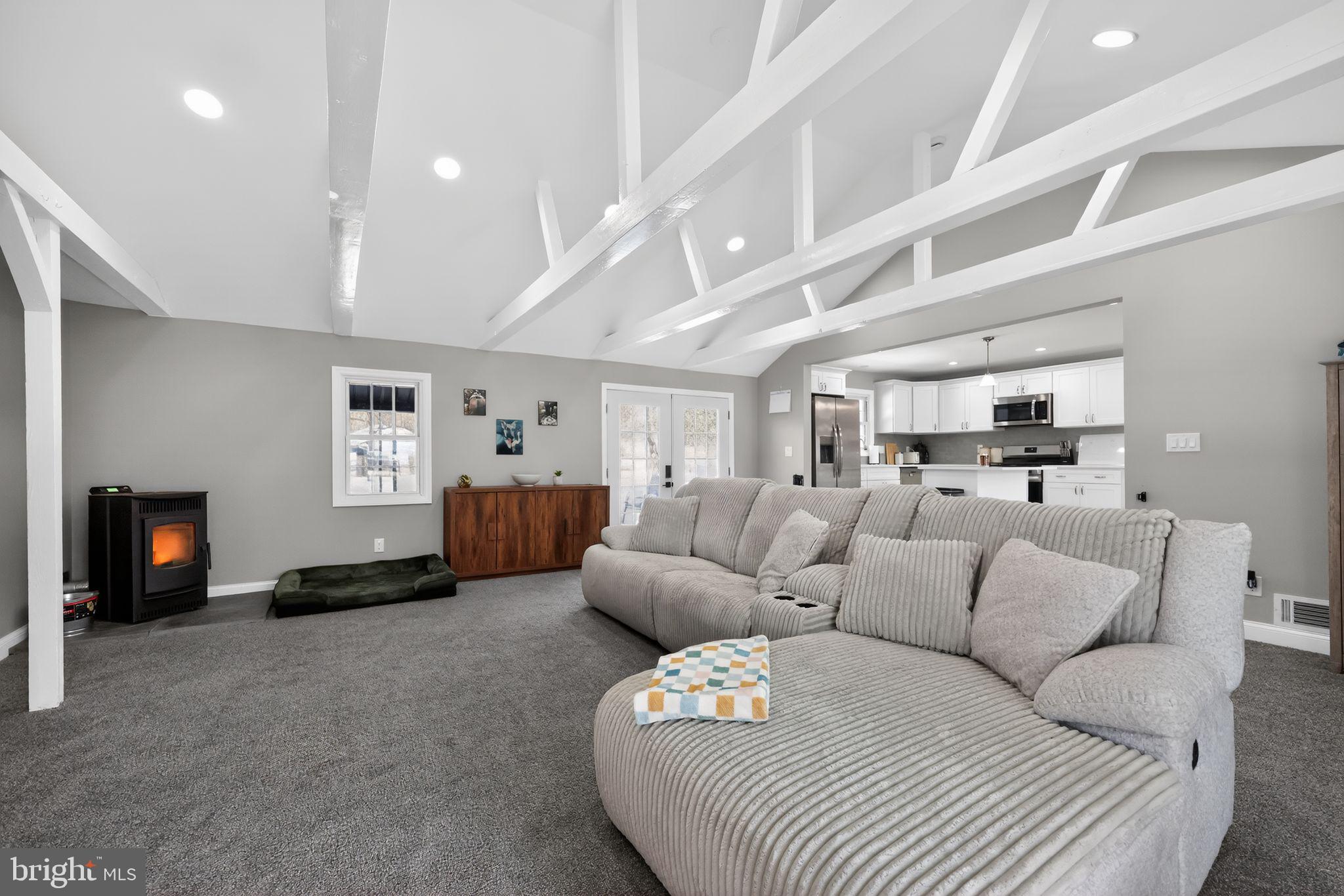 298 South Tuckahoe Road Williamstown, NJ 08094 - Photo 5 of 22 a living room with furniture and a fireplace