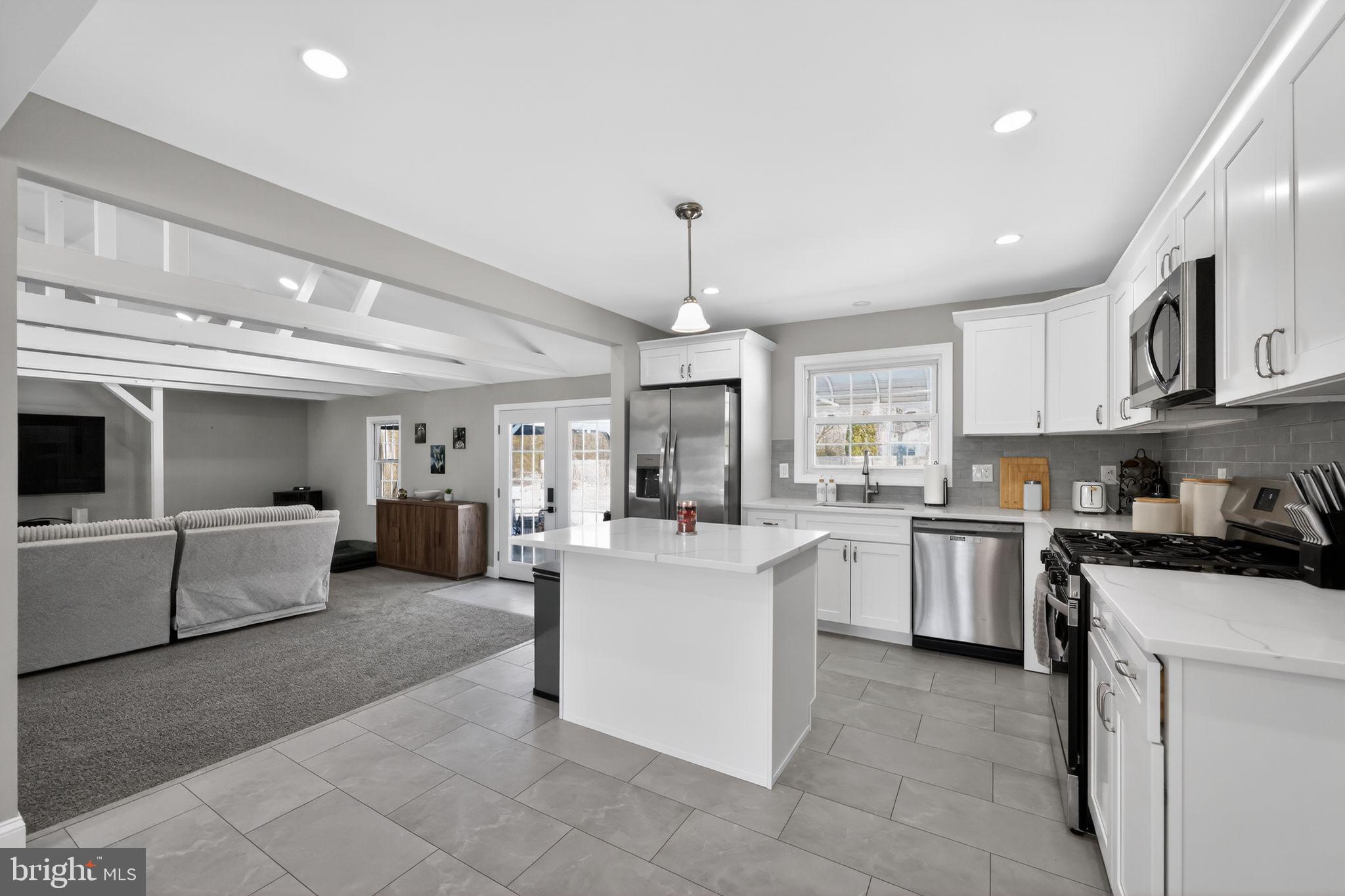 298 South Tuckahoe Road Williamstown, NJ 08094 - Photo 7 of 22 a kitchen with counter top space appliances and cabinets