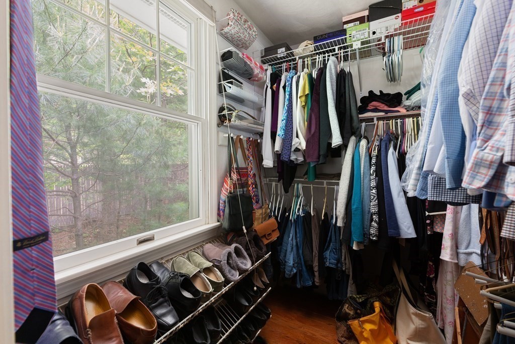 64 Rattlesnake Hill Road Andover, MA 01810 - Photo 15 of 23 a view of walk in closet with clothes and shoes