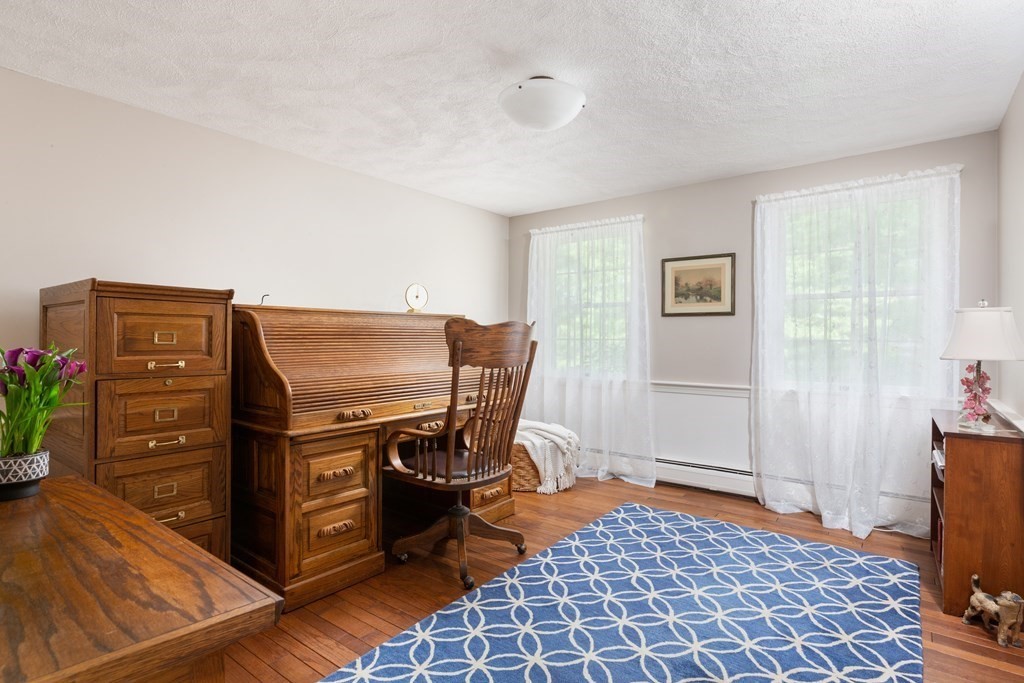 64 Rattlesnake Hill Road Andover, MA 01810 - Photo 8 of 23 a bedroom with furniture and a window