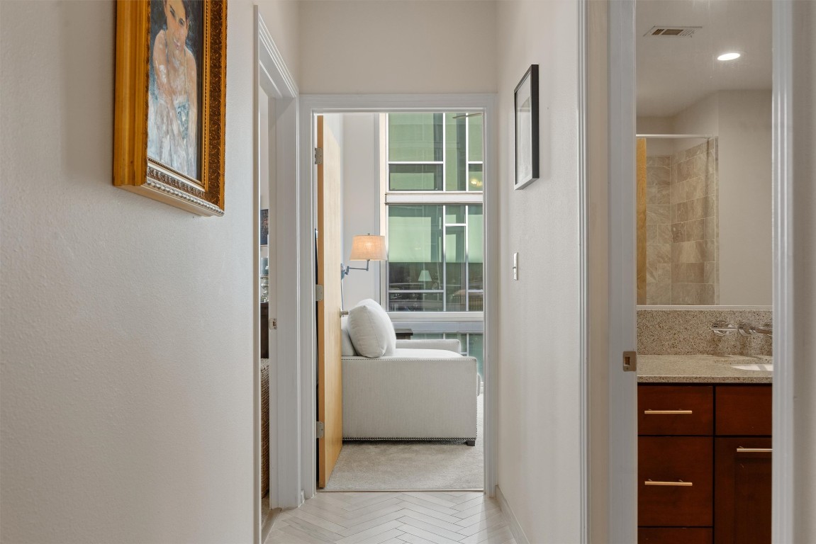 1600 Barton Springs Road, Unit 5301 Austin, TX 78704 - Photo 13 of 30 a bathroom with a sink and tub