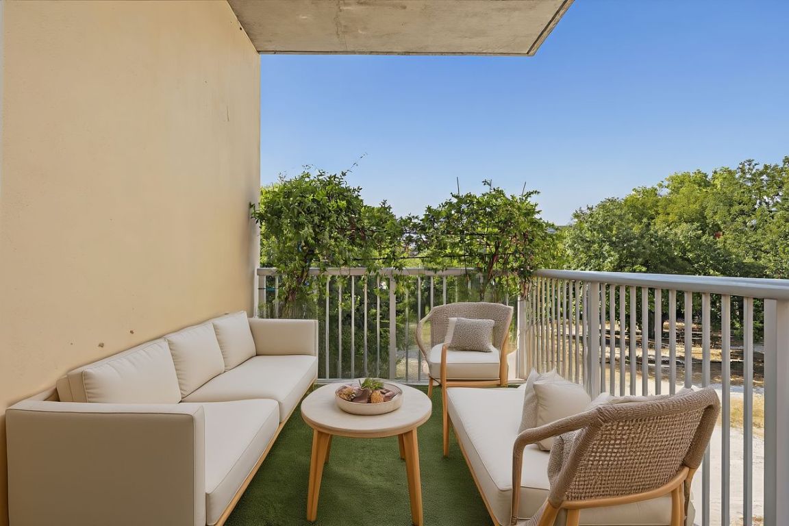 1600 Barton Springs Road, Unit 5301 Austin, TX 78704 - Photo 4 of 30 Large 1st balcony with an outdoor hangout area