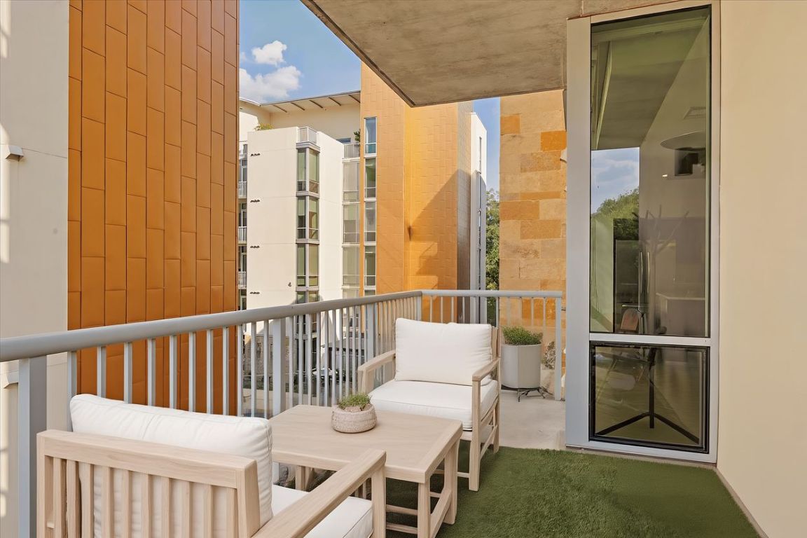 1600 Barton Springs Road, Unit 5301 Austin, TX 78704 - Photo 5 of 30 a view of a balcony with furniture