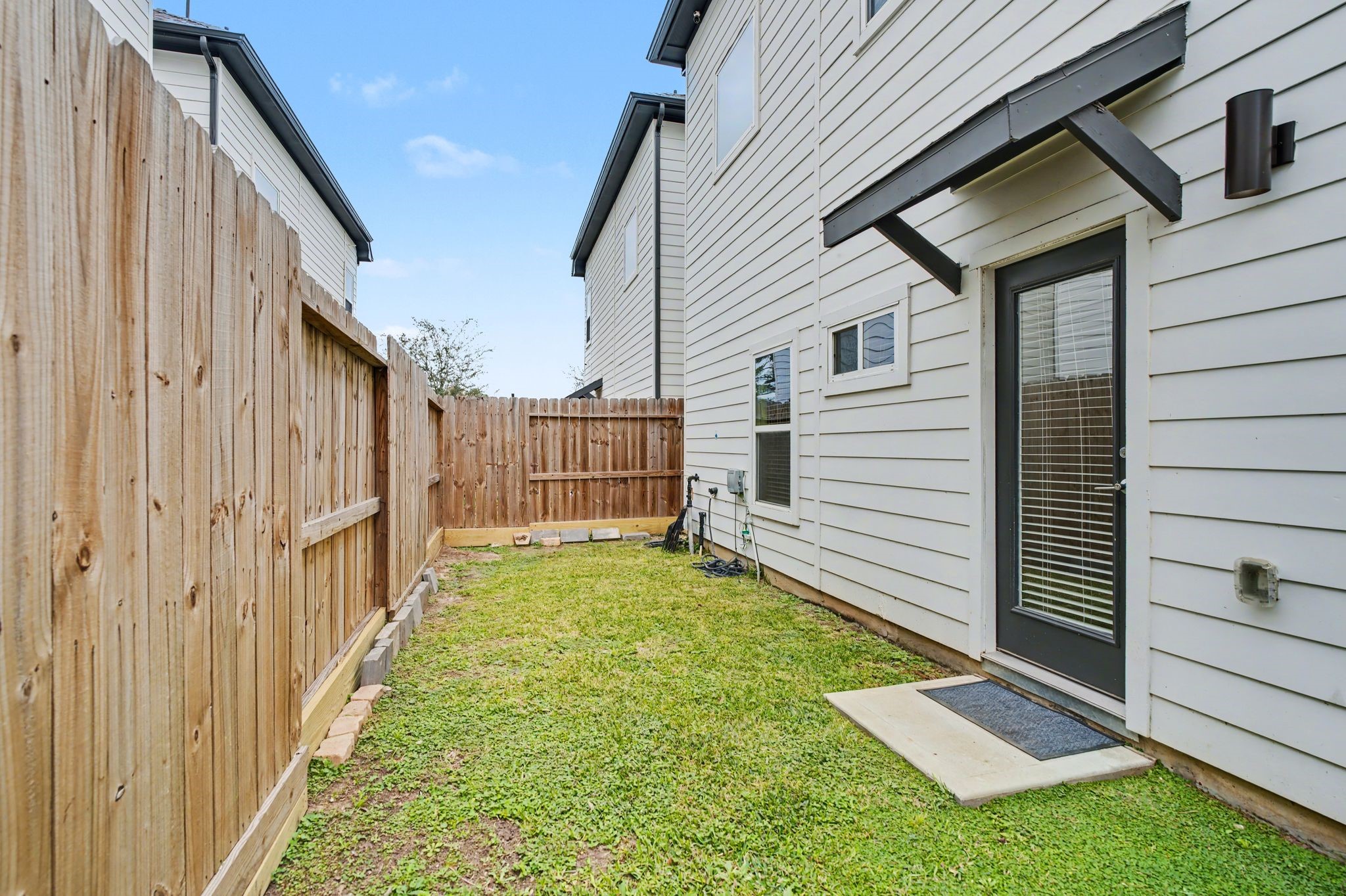 2504 West Tidwell Road, Unit B Houston, TX 77091 - Photo 23 of 24 Step outside, and you’ll discover a
private backyard that’s a true
hidden gem.