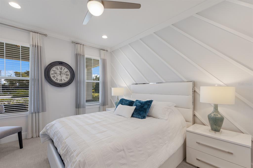 5557 Long Shore Loop Sarasota, FL 34238 - Photo 30 of 90 a bedroom with a bed and a closet