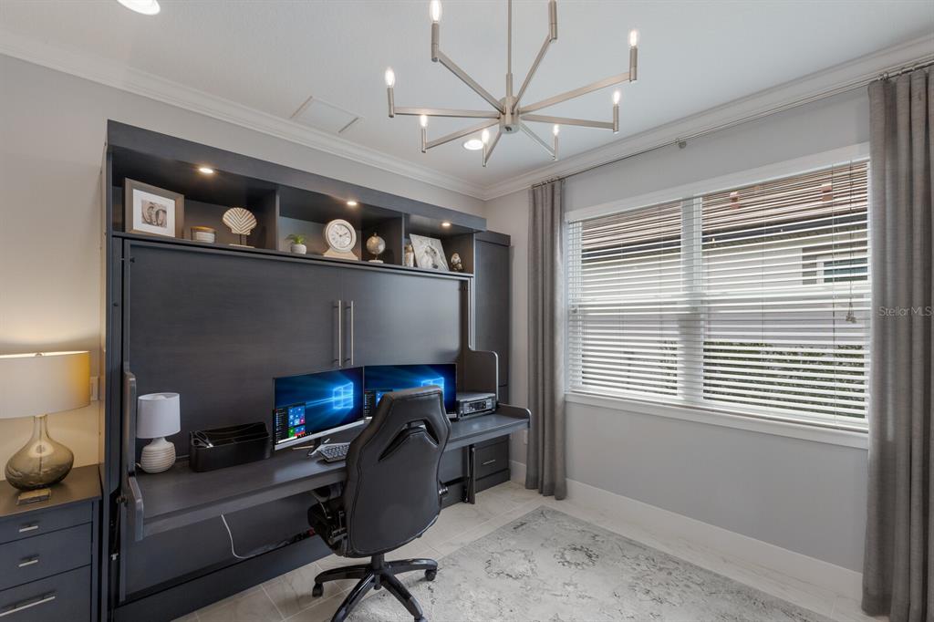 5557 Long Shore Loop Sarasota, FL 34238 - Photo 36 of 90 a view of a workspace with furniture and a window