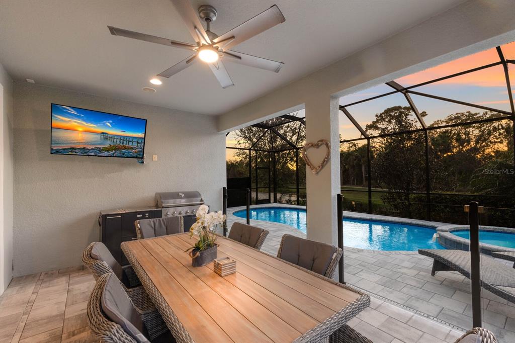 5557 Long Shore Loop Sarasota, FL 34238 - Photo 4 of 90 a view of a dining room with furniture window and outside view