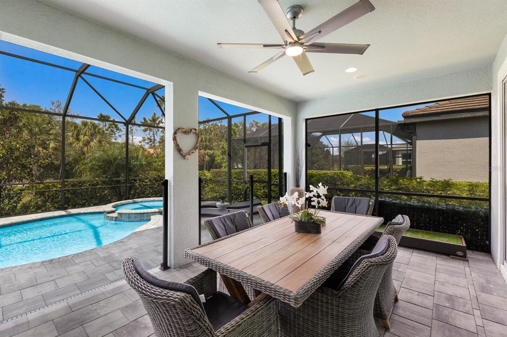 5557 Long Shore Loop Sarasota, FL 34238 - Photo 44 of 90 a view of a dining room with furniture window and outside view