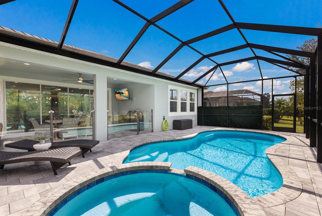 5557 Long Shore Loop Sarasota, FL 34238 - Photo 48 of 90 a view of swimming pool with seating space