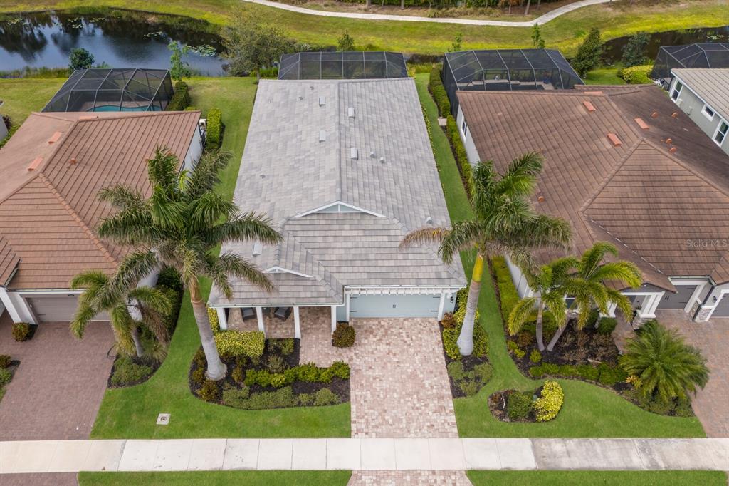5557 Long Shore Loop Sarasota, FL 34238 - Photo 50 of 90 an aerial view of a house with a yard