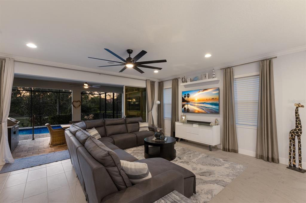 5557 Long Shore Loop Sarasota, FL 34238 - Photo 61 of 90 a living room with furniture and a large window