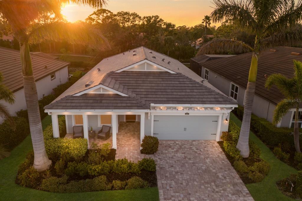 5557 Long Shore Loop Sarasota, FL 34238 - Photo 65 of 90 a view of a house with a yard