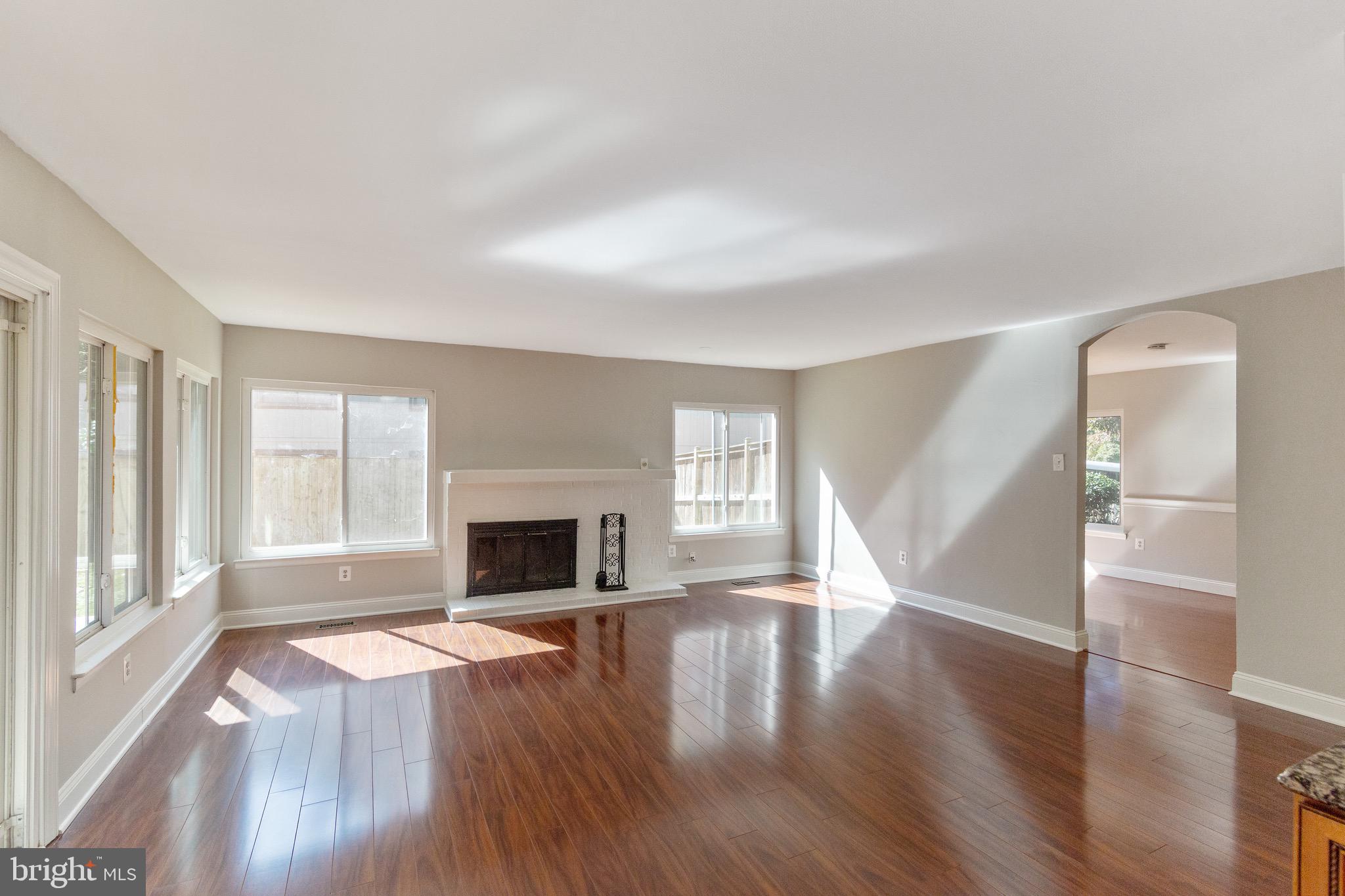 9104 Tulip Grove Road Gaithersburg, MD 20879 - Photo 9 of 27 Family Room with wood burning fireplace