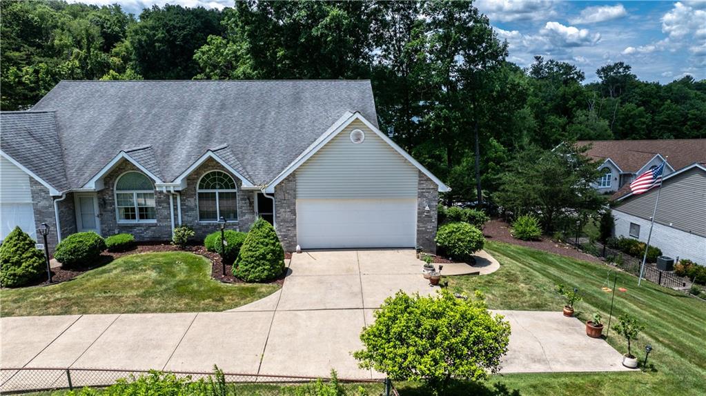 228 Country View Drive Lower Burrell, PA 15068 - Photo 2 of 49 a aerial view of a house in front of a yard with potted plants