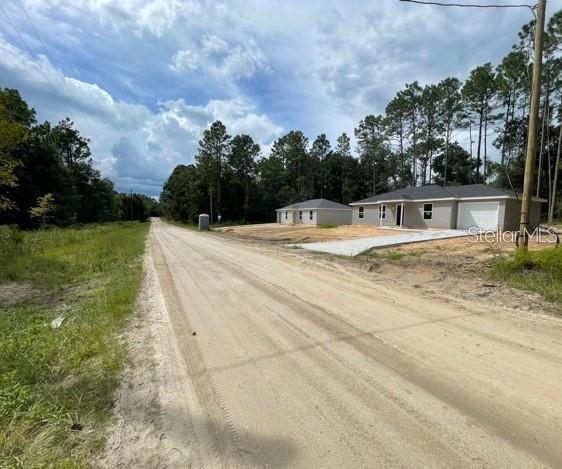 0 Southwest 16th Place Ocala, FL 34481 - Photo 4 of 4 a swimming pool with wooden fence