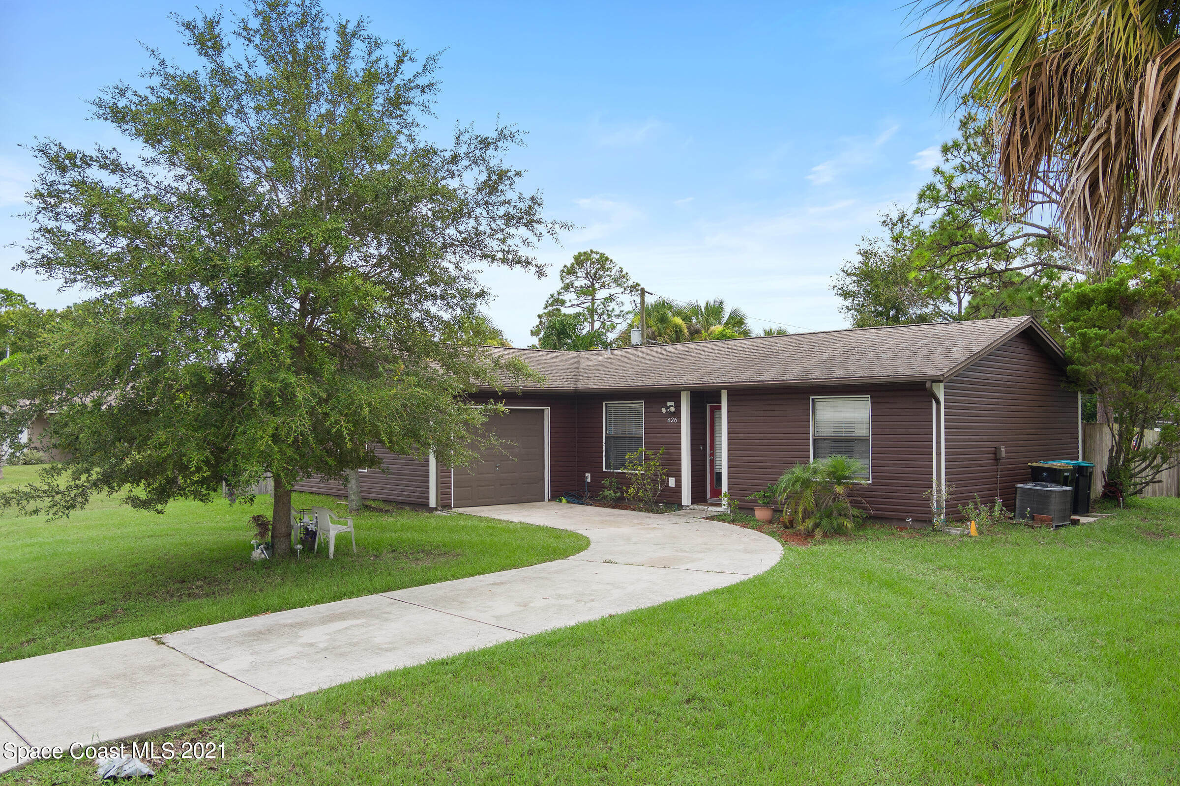 426 Crystal Mist Road Northwest Palm Bay, FL 32907 - Photo 1 of 26 20210827 426 Crystal Mist Rd PAGE-1001