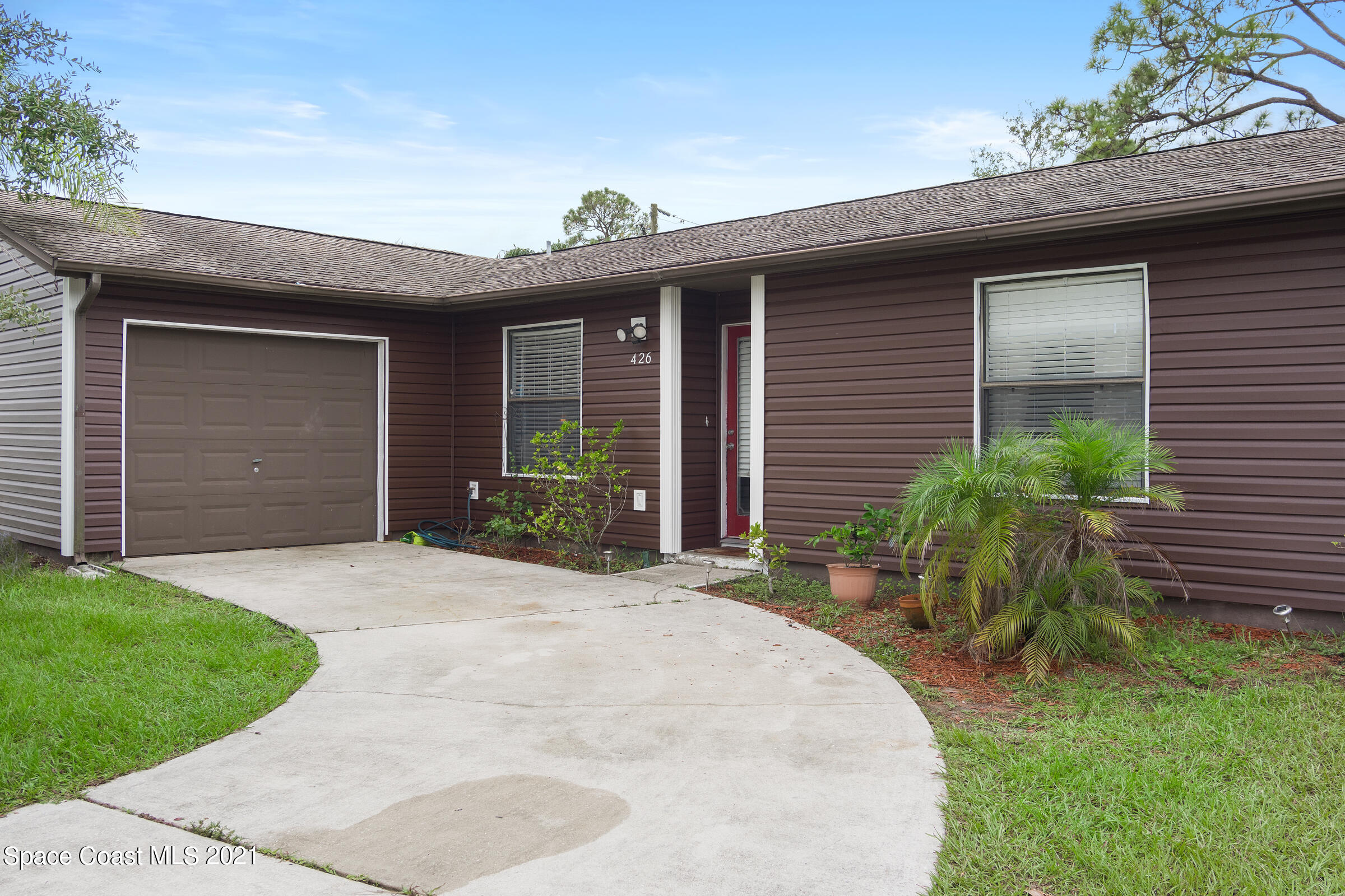 426 Crystal Mist Road Northwest Palm Bay, FL 32907 - Photo 2 of 26 20210827 426 Crystal Mist Rd PAGE-1018