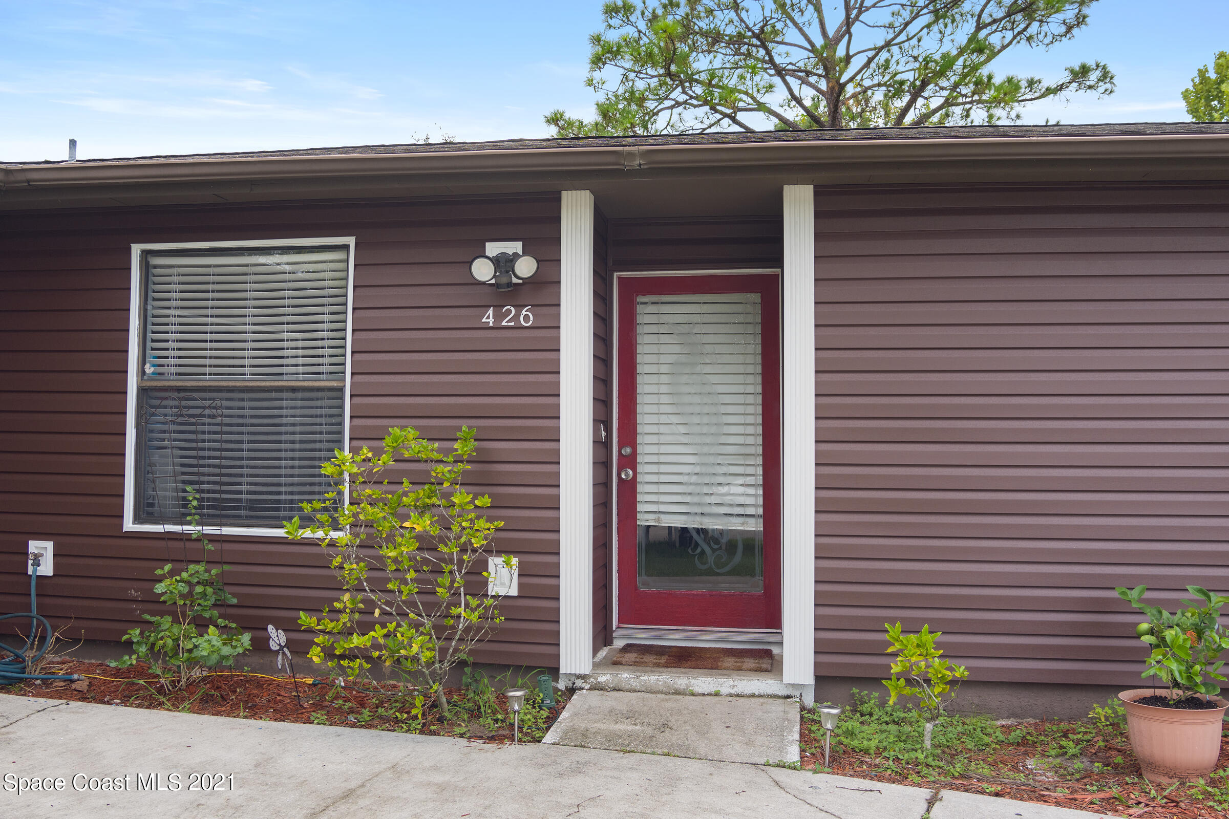 426 Crystal Mist Road Northwest Palm Bay, FL 32907 - Photo 3 of 26 20210827 426 Crystal Mist Rd PAGE-1002