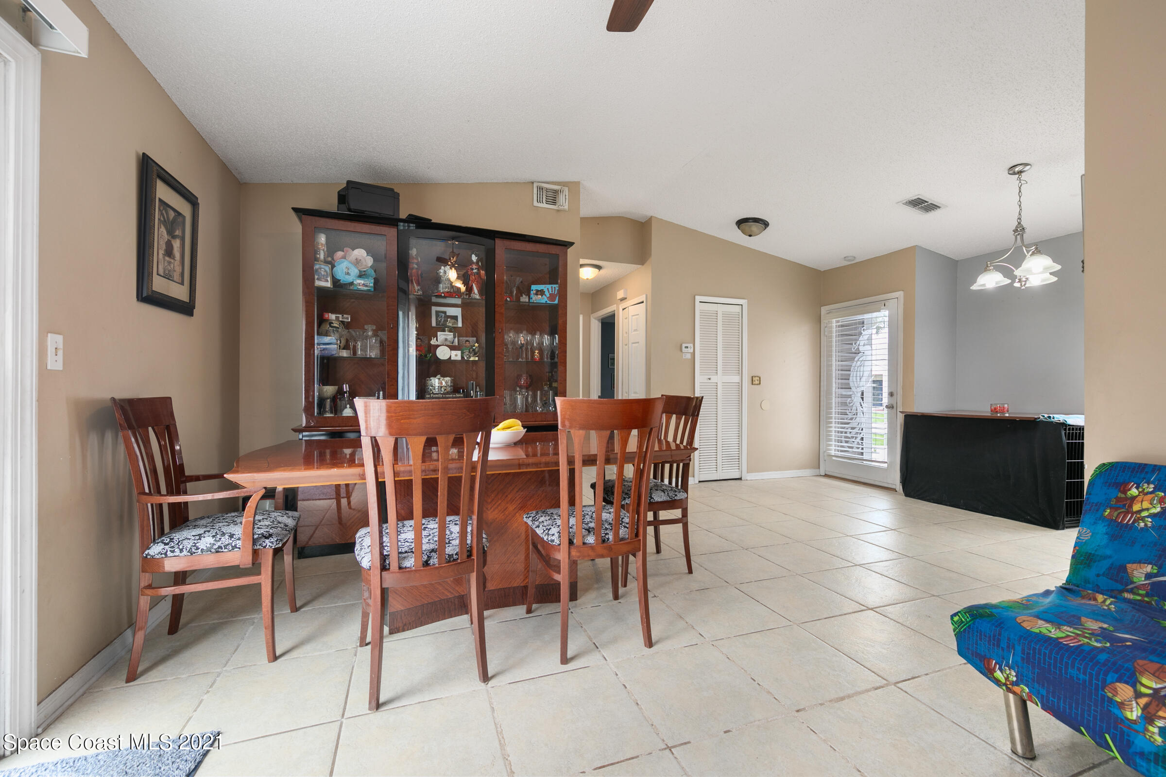 426 Crystal Mist Road Northwest Palm Bay, FL 32907 - Photo 4 of 26 20210827 426 Crystal Mist Rd PAGE-1005