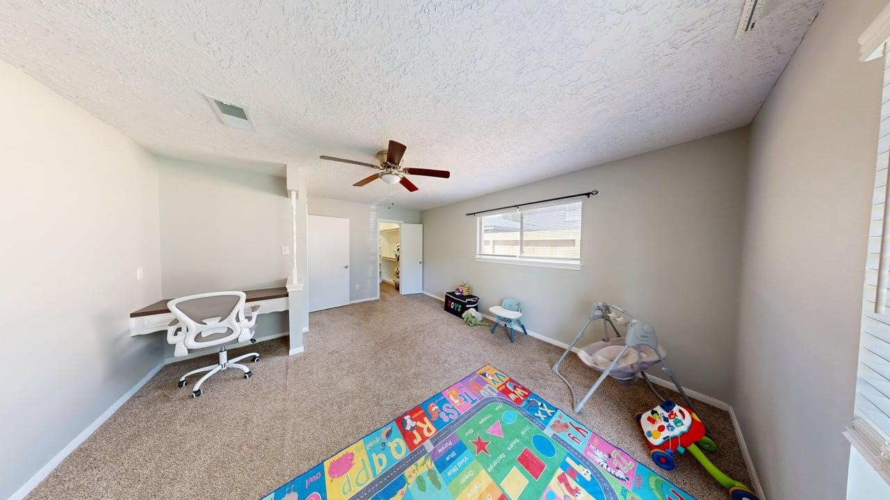 619 Cotter Drive Spring, TX 77373 - Photo 16 of 50 a bed room with a bed and a window
