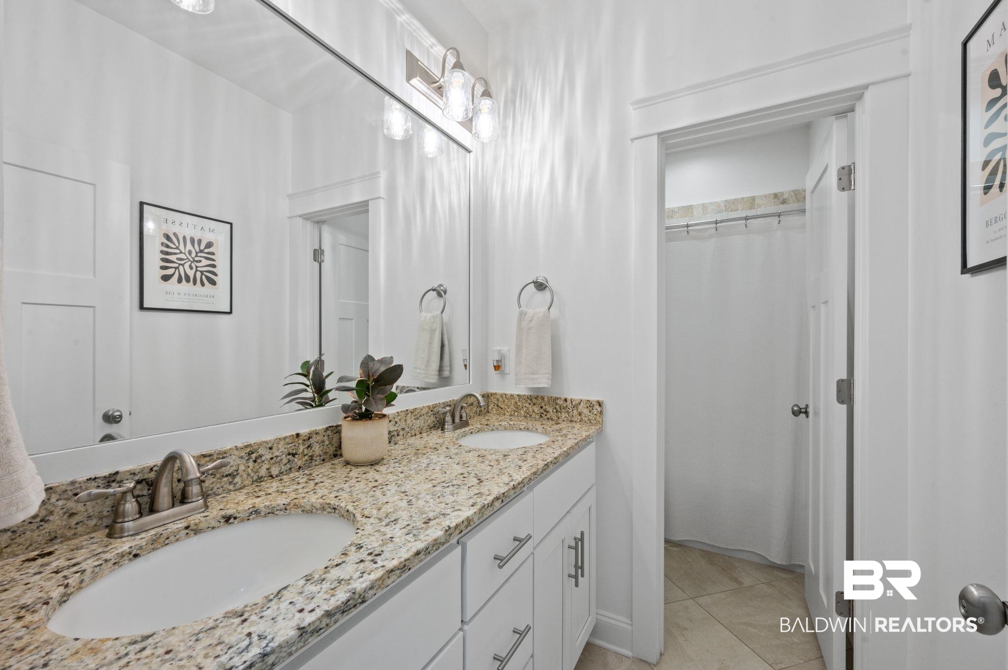 418 Fortune Drive Fairhope, AL 36532 - Photo 43 of 63 Bathroom with double sink vanity and tile patterned flooring