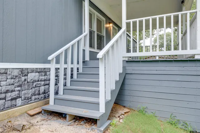 a view of entryway with wooden floor