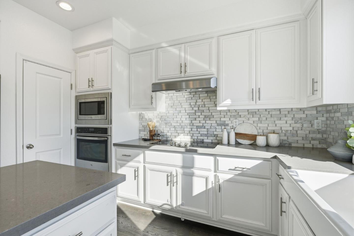 2039 Colony Street Mountain View, CA 94043 - Photo 14 of 43 a kitchen with stainless steel appliances granite countertop a sink stove and refrigerator