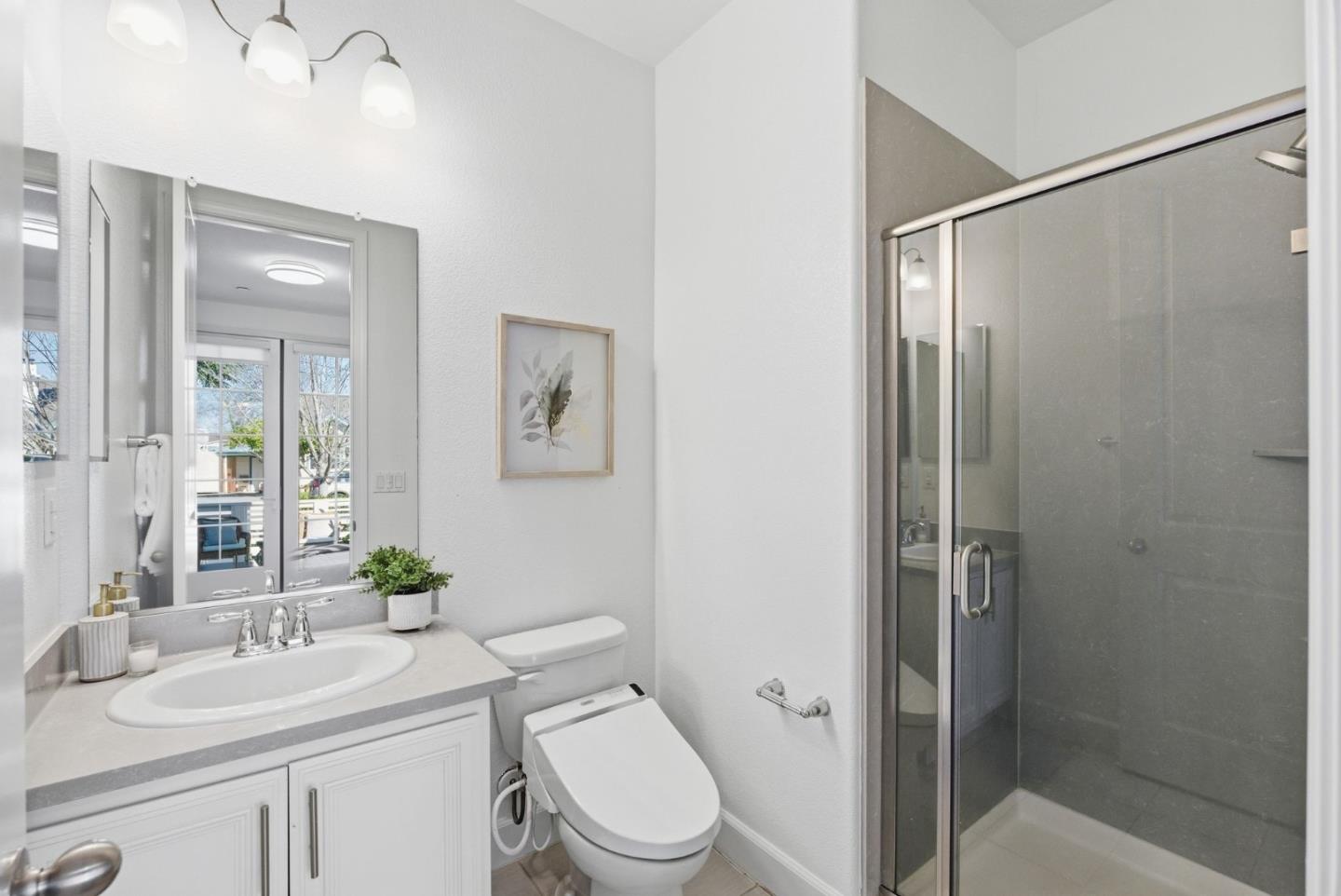 2039 Colony Street Mountain View, CA 94043 - Photo 20 of 43 a bathroom with a sink a toilet and shower