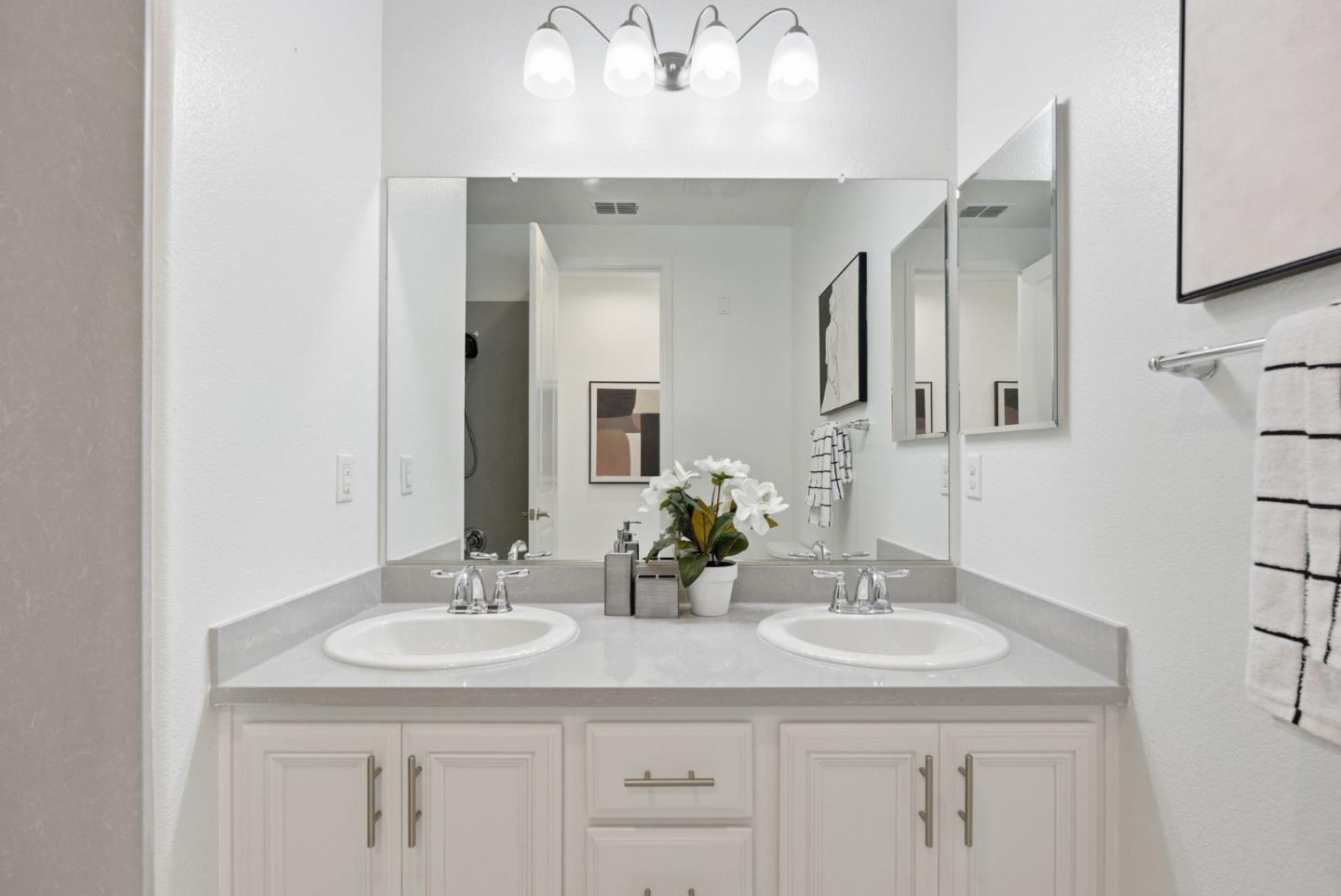 2039 Colony Street Mountain View, CA 94043 - Photo 21 of 43 a bathroom with a sink double vanity and a mirror