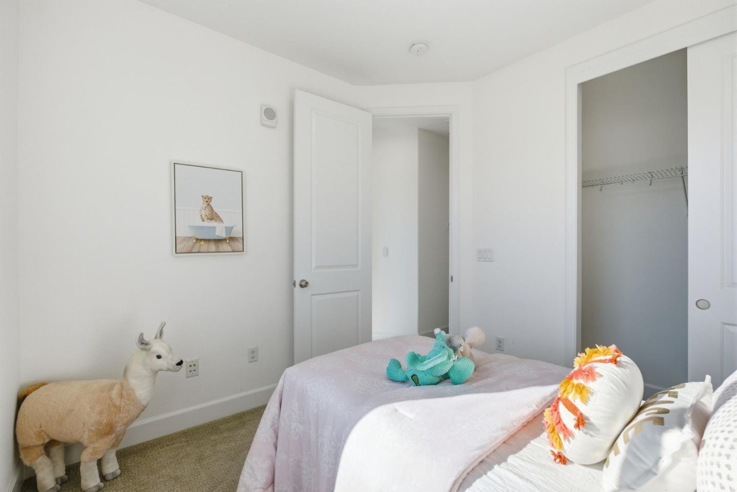 2039 Colony Street Mountain View, CA 94043 - Photo 26 of 43 a bedroom with a bed and a chair