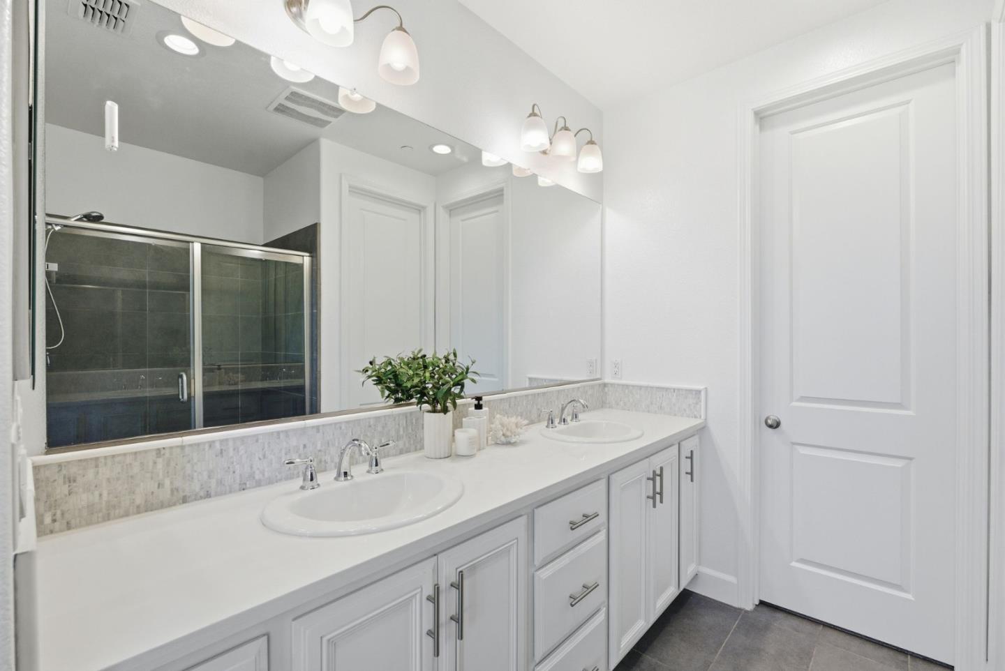 2039 Colony Street Mountain View, CA 94043 - Photo 32 of 43 a bathroom with a sink vanity granite and a mirror