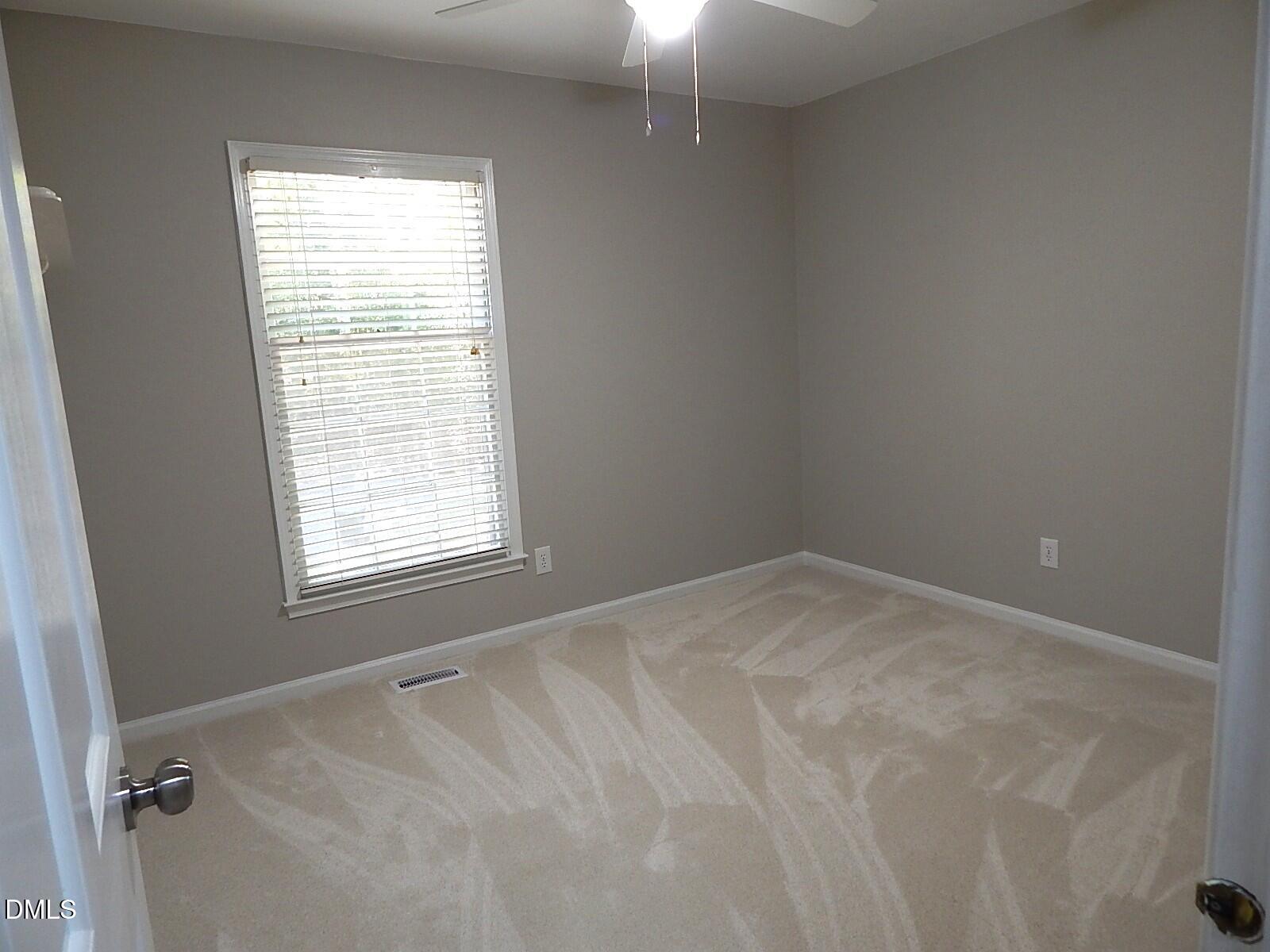 6408 Shadow Court Raleigh, NC 27613 - Photo 23 of 35 a view of empty room with a window