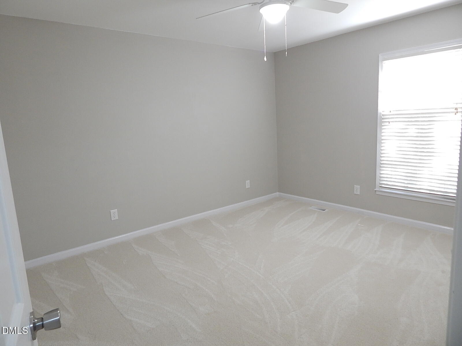 6408 Shadow Court Raleigh, NC 27613 - Photo 24 of 35 an empty room with a window