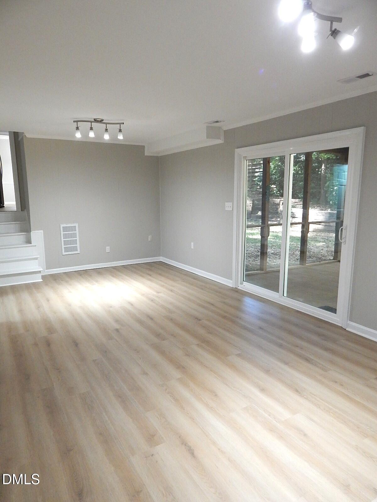6408 Shadow Court Raleigh, NC 27613 - Photo 27 of 35 a view of a livingroom with wooden floor