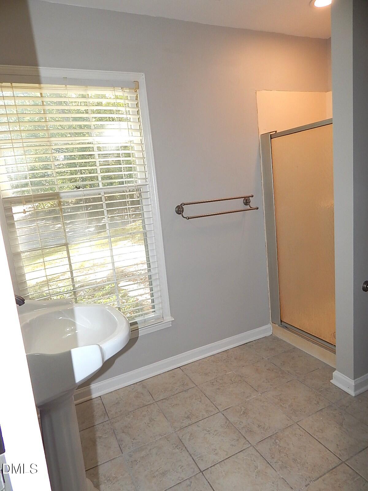 6408 Shadow Court Raleigh, NC 27613 - Photo 32 of 35 a view of an empty room with a window