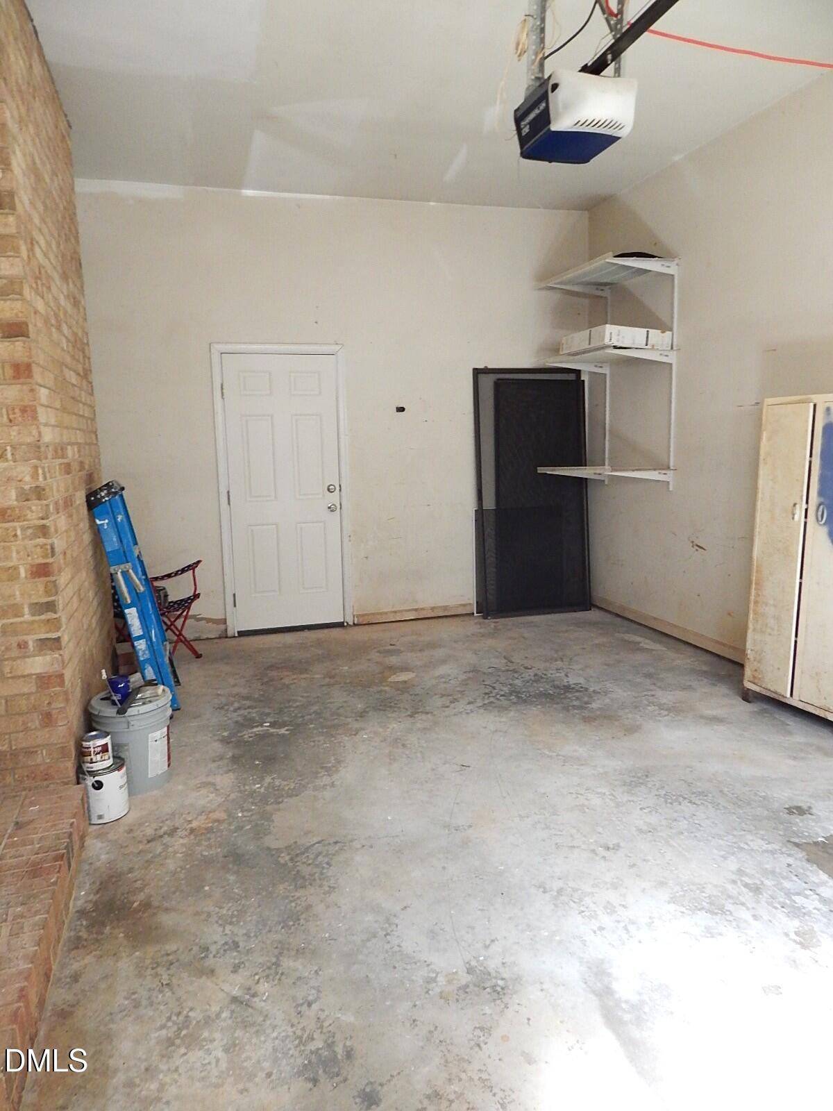 6408 Shadow Court Raleigh, NC 27613 - Photo 34 of 35 a view of a room with gym equipment