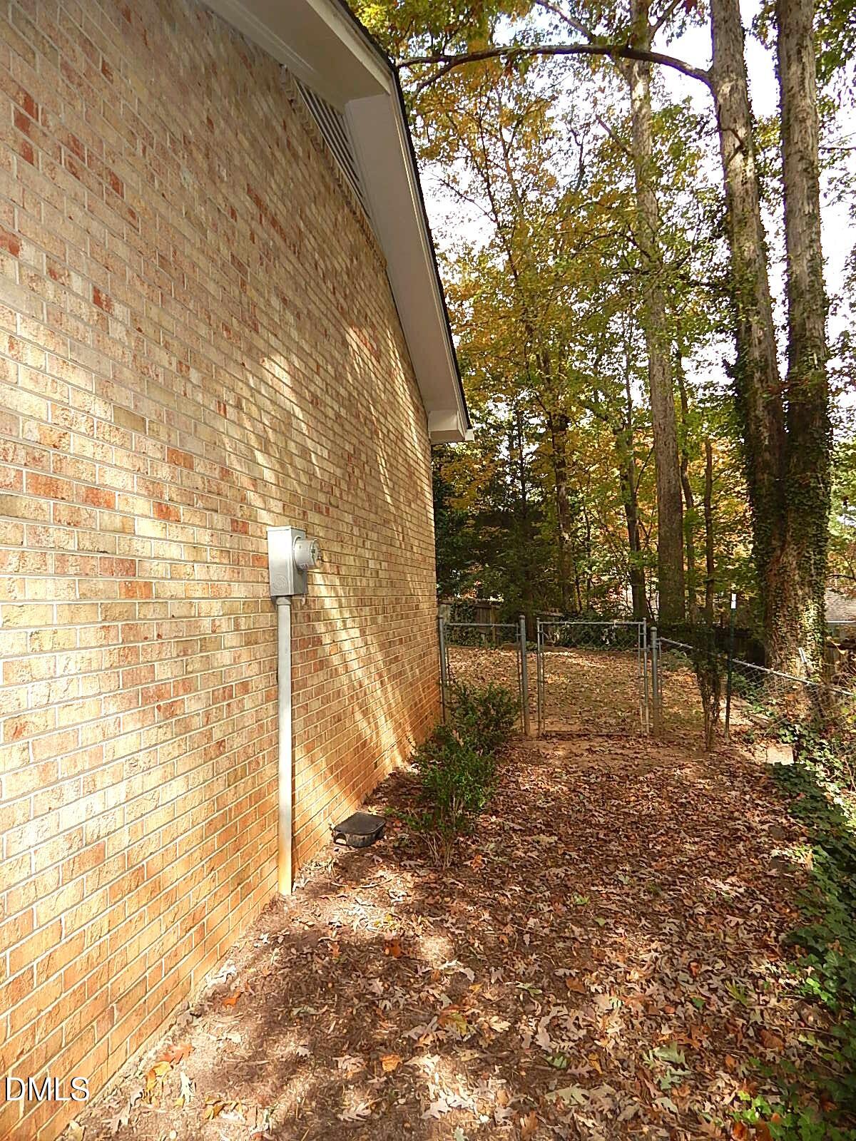 6408 Shadow Court Raleigh, NC 27613 - Photo 9 of 35 a view of a yard with trees