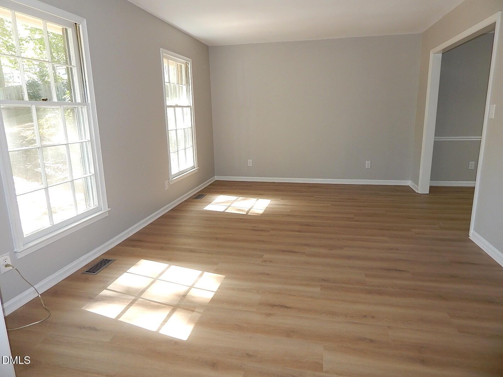 6408 Shadow Court Raleigh, NC 27613 - Photo 10 of 35 a view of an empty room and window
