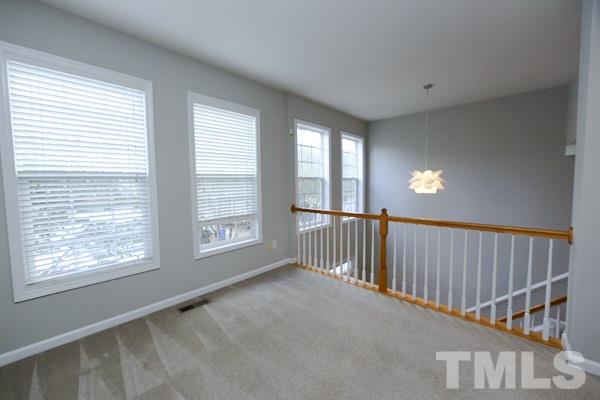 5422 Echo Ridge Road Raleigh, NC 27612 - Photo 3 of 14 a view of staircase with window