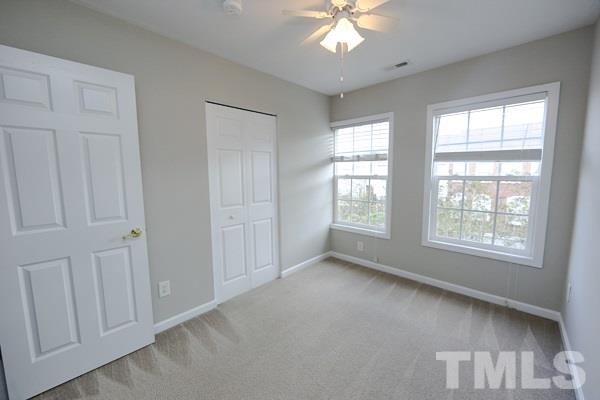 5422 Echo Ridge Road Raleigh, NC 27612 - Photo 6 of 14 a view of an empty room with a window