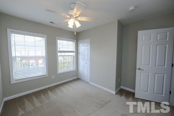 5422 Echo Ridge Road Raleigh, NC 27612 - Photo 7 of 14 a view of an empty room with a window