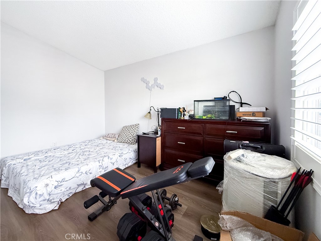 1855 East Riverside, Unit 130 Ontario, CA 91761 - Photo 34 of 62 a living room with furniture and window