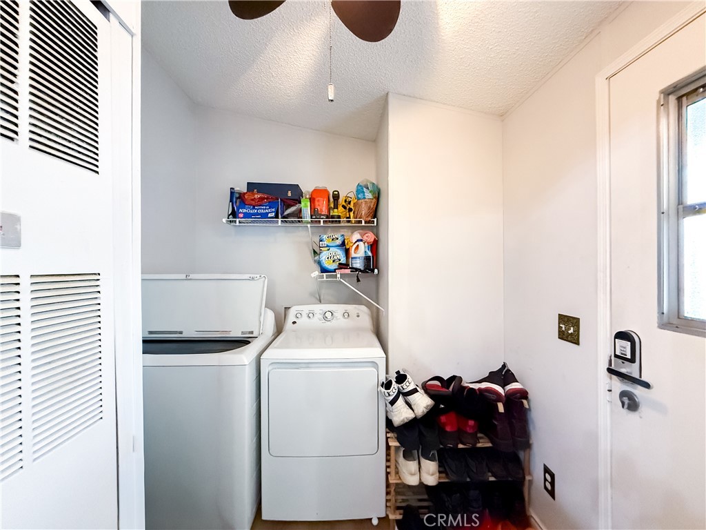 1855 East Riverside, Unit 130 Ontario, CA 91761 - Photo 49 of 62 a utility room with dryer and washer