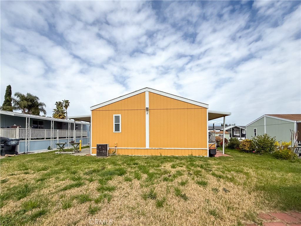 1855 East Riverside, Unit 130 Ontario, CA 91761 - Photo 55 of 62 a view of a backyard