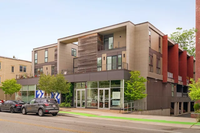 a view of a building and a street