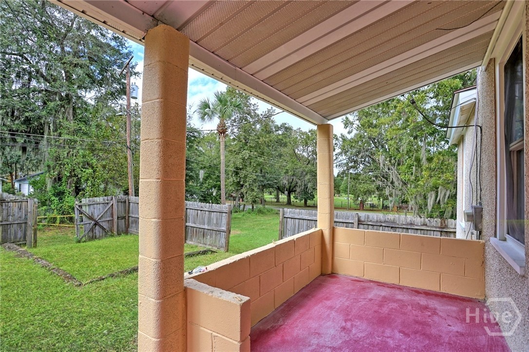1023 West 37th Street Savannah, GA 31415 - Photo 27 of 33 The back porch overlooks the private yard.